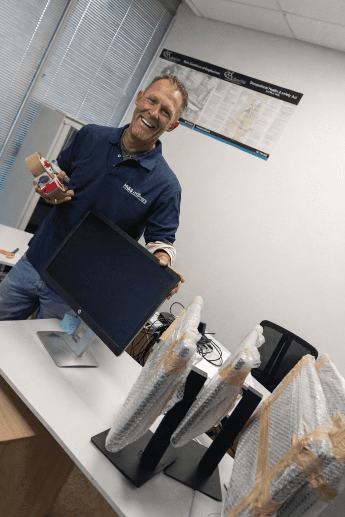 New office computer setup ready for move with professional packing by MGS Movers in South Africa.
