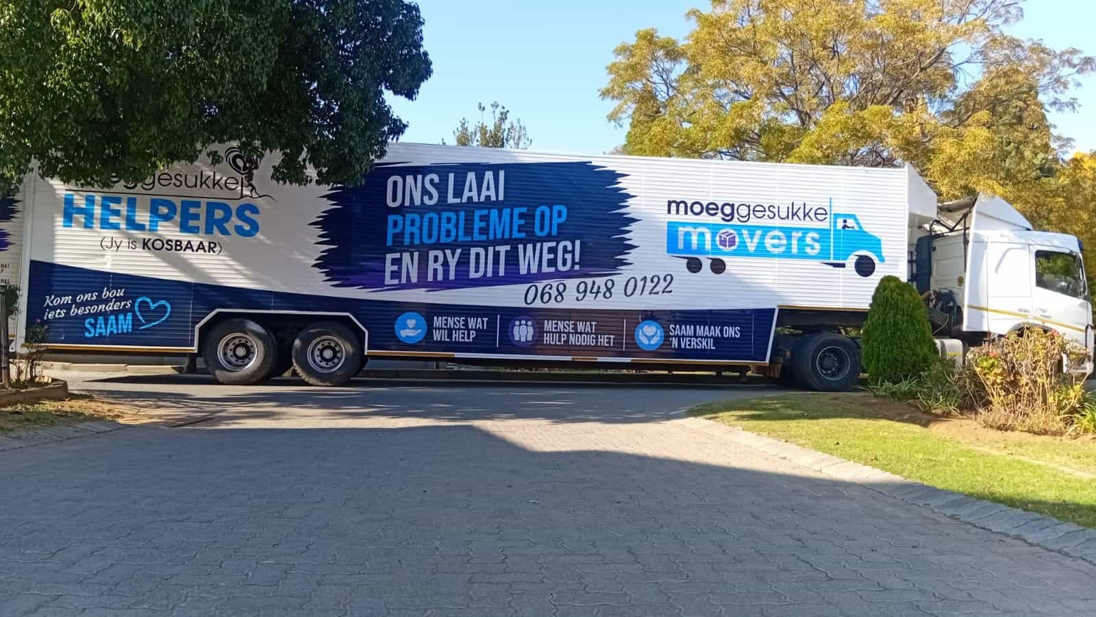 Moving truck with MGSMovers branding parked outdoors in South Africa.